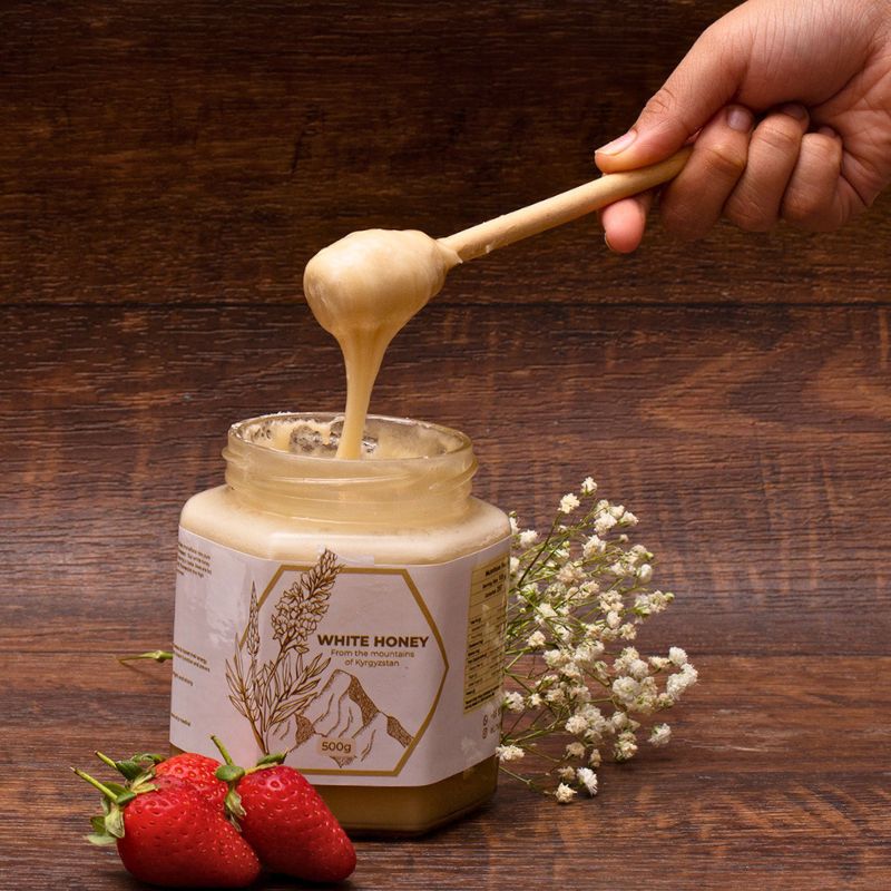 AlHoney's delicious creamy white honey. Showing the purity and thickness of white honey.