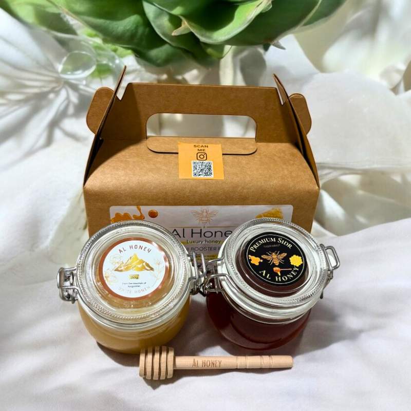 Top view of Al honey booster pack with wooden dipper