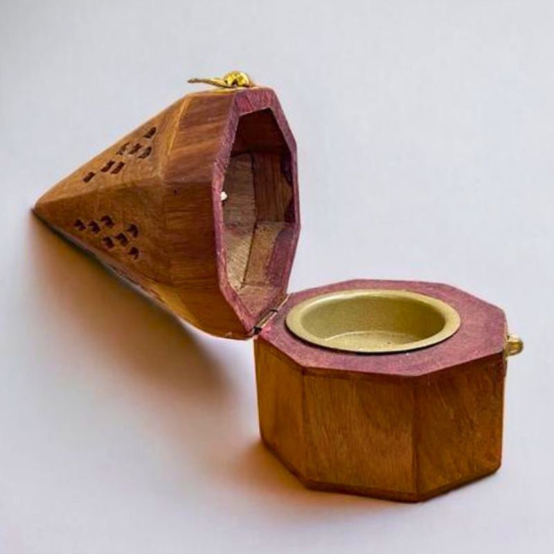 Showing an opened woody Oasis wooden hex pyramid shaped burner for bukhoor, oud and agarwood. 
